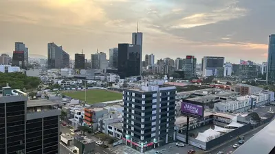 a view of a city with tall buildings at Luxury apartment with panoramic view of San Isidro in Lima