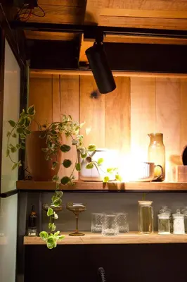 a kitchen shelf with potted plants on it at Mountain lodge with Spectacular View in Cusco