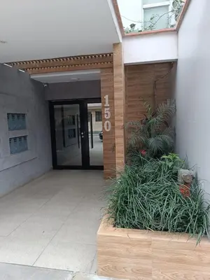 an entrance to a building with a sign that at Departamento con vista al Circuito Mágico del Agua in Lima