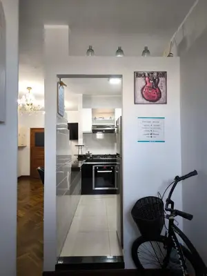 a kitchen with a bike parked in a room at Lindo apartmento en PLAZA PRINCIPAL in Lima