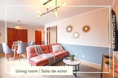 a living room with a couch and a table at Vibrant Exclusive 1BR Apt in front of Casa Andina in Lima