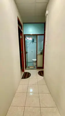 an empty hallway with a toilet in a room at Templo de la Luna Pardo in Cusco