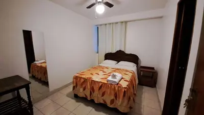 a bedroom with a bed in a room at Hospedaje Las Vegas in San Vicente de Cañete