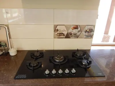 a stove top oven in a kitchen with some dishes at Casa Higospampa, 2 Floors Up to 7 Residents in Urubamba