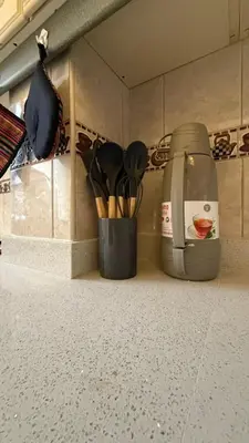 a kitchen counter with a blender and utensils at Casa Amplia en Miraflores in Lima