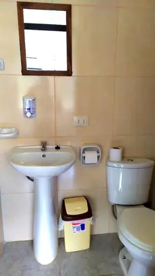 a bathroom with a sink and a toilet at Mountainview House Ollantaytambo in Ollantaytambo