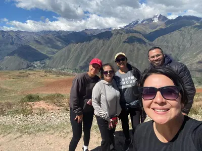 a group of people standing on top of a mountain at Casa Moriáh in Maras