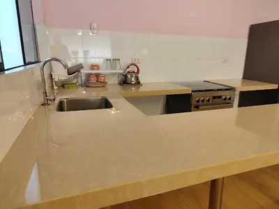 a kitchen with a sink and a counter top at Apartamento Limas Airport in Lima