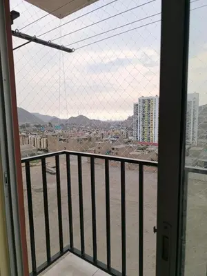 a view of a city from a balcony at apartment Campoy for tourist in Lima