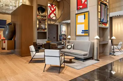 a lobby of a hotel with chairs and tables at InterContinental Real Lima Miraflores by IHG in Lima
