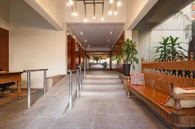 a hallway with a table and benches in a building at GRM302 Apt Moderno 2 DRM with KING Bed in Miraflores in Lima
