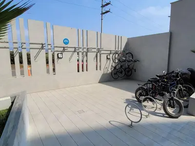 a group of bikes parked on the side of a building at Dpto de Playa Miramar San Bartolo in San Bartolo