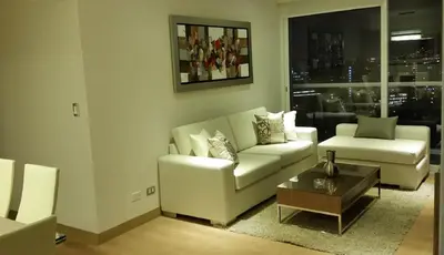 a living room with a couch and a coffee table at Peru Rent Apart com pe in Lima