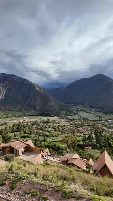 a view of a village with mountains in the background at Casa Catahuasi , Sacred Valley ,Urubamba,Cusco, Peru in Urubamba