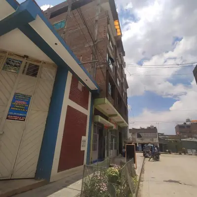 a building on the side of a street at Depawanka habitacion amoblado in Huancayo