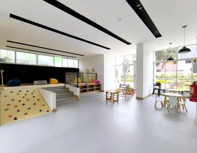 a large room with a climbing wall and a rock wall at Departamento en Santa Catalina cerca a San Isidro in Lima