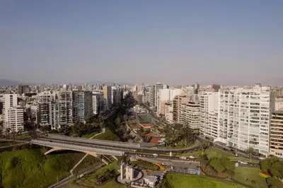 an aerial view of a city with a highway at Apartment in Lima in Lima