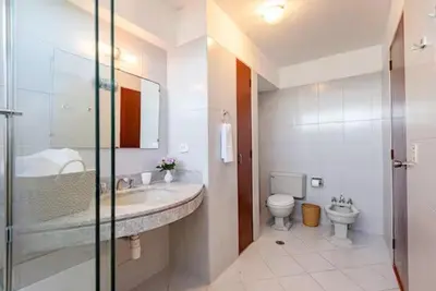a bathroom with a sink and a toilet at M701 Malecón View Apartment 3 BDR in Lima