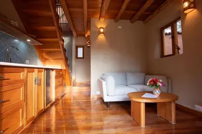 a living room with a couch and a table at Stunning 1BR House in Camino Real in Urubamba