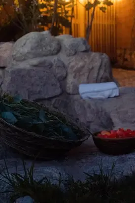 two baskets of flowers and a bowl of fruit at Stunning 1BR House in Camino Real in Urubamba