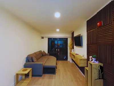 a living room with a couch and a table at Perfect location in Barranco in Lima