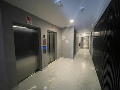 a hallway of a building with doors and a hallwayngth at Chelovirock- Luxury Penthouse Great Location in Lima