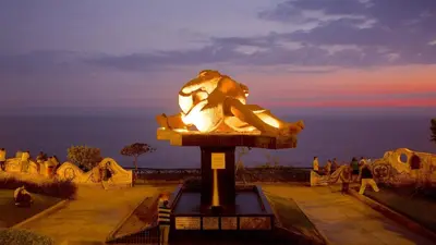 a statue of a woman sitting on top of the ocean at Chelovirock- Luxury Penthouse Great Location in Lima