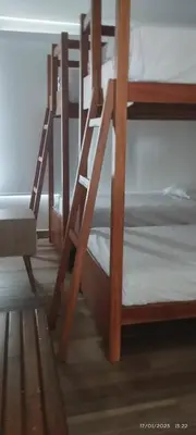a group of bunk beds in a room at Zen Home & Relax - Chincha in Chincha Baja