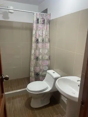 a bathroom with a toilet and a sink at Quechuas in Cusco