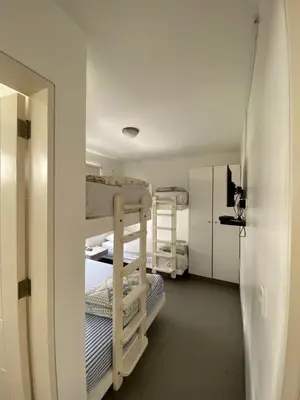 a small room with two bunk beds in it at Dpto en Paracas con vista al Mar in Paracas