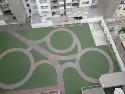 an aerial view of the olympic rings on a tennis court at Departamento 5p Lima Centro 3 dormitorios 4 camas in Lima