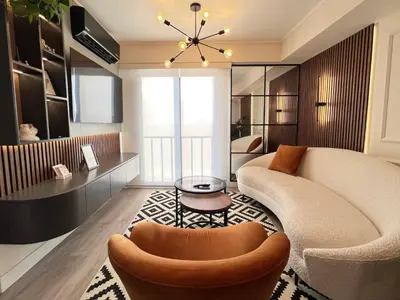 a living room with a couch and a table at Design Apartment with city view! - Miraflores in Lima