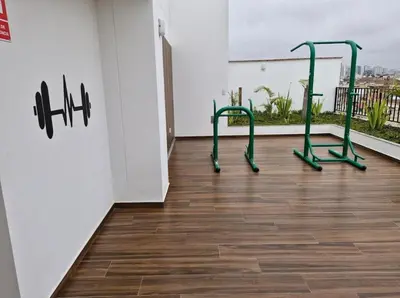 an empty room with green metal detectors on a floor at Apartamento Mary in Lima