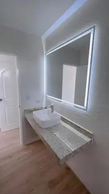 a bathroom with a sink and a mirror at CA4 - Casa con Jacuzzi privado - Playa Pulpos in Punta Hermosa