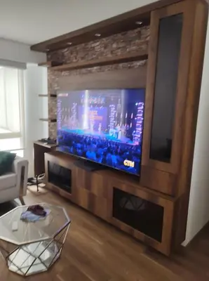 a living room with a large flat screen tv at Departamento de 3 habitaciones in Lima