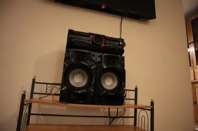 a speaker sitting on top of a shelf at Casa Canal - 3 cuadras de la Plaza de Armas in Cusco