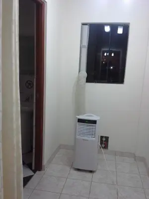 a room with a window and a heater in a room at Angelica's House - Apartments Lima - Near the Airport in Lima