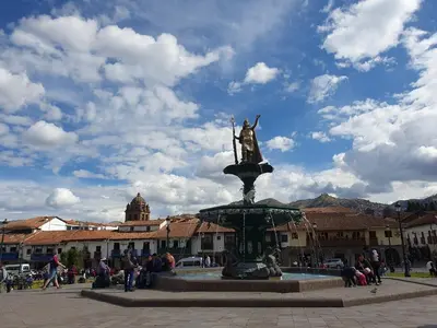 a statue of a man on top of a fountain at Your 2nd home in residential area in Cusco