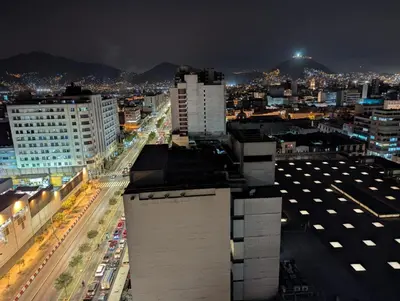 a view of a city at night at Amplia habitación en centro de Lima in Lima