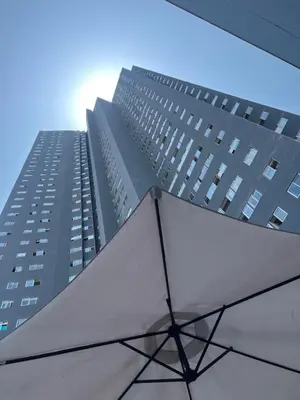 a view of a tall building with a building at Loft Ale Piso 22 in Lima