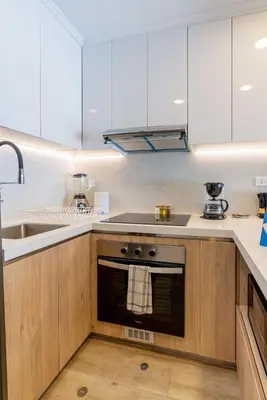 a kitchen with a stove and a sink at Samoa 1BR by Geko in Lima