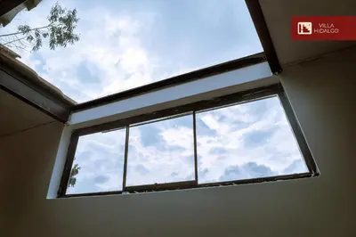 a window in a room with the sky at Villa Hidalgo - Centro Vacacional in Pazos