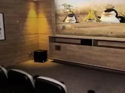 a room with a bed and some chairs in it at Apartamento en San Miguel hermosa vista al mar in Lima