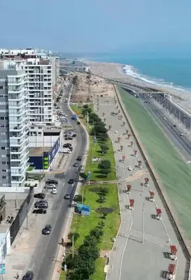 an aerial view of a road with a beach and buildings at Apartamento en San Miguel hermosa vista al mar in Lima