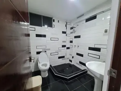 a bathroom with a toilet and a sink at apartment MAGIC in Ayacucho