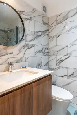 a bathroom with a sink and a mirror at Zafira 1BR by Geko in Lima