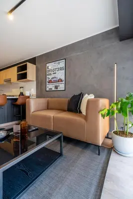 a living room with a couch and a table at Miraflores Modern Apartments Benavides by Geko in Lima