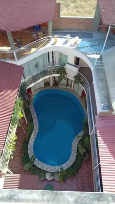 an overhead view of a swimming pool in a building at Residencial Misky Dreams in Huánuco