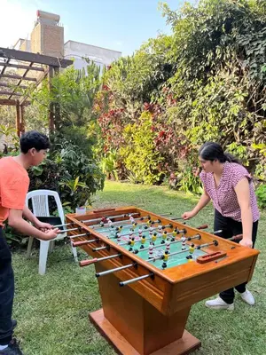 a man and a woman playing a game of chess at casa de campo en cieneguilla in Cieneguilla