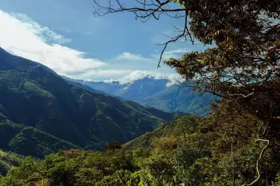 a view of a valley in the mountains at Ecoterra Inka Lodge in Quillabamba